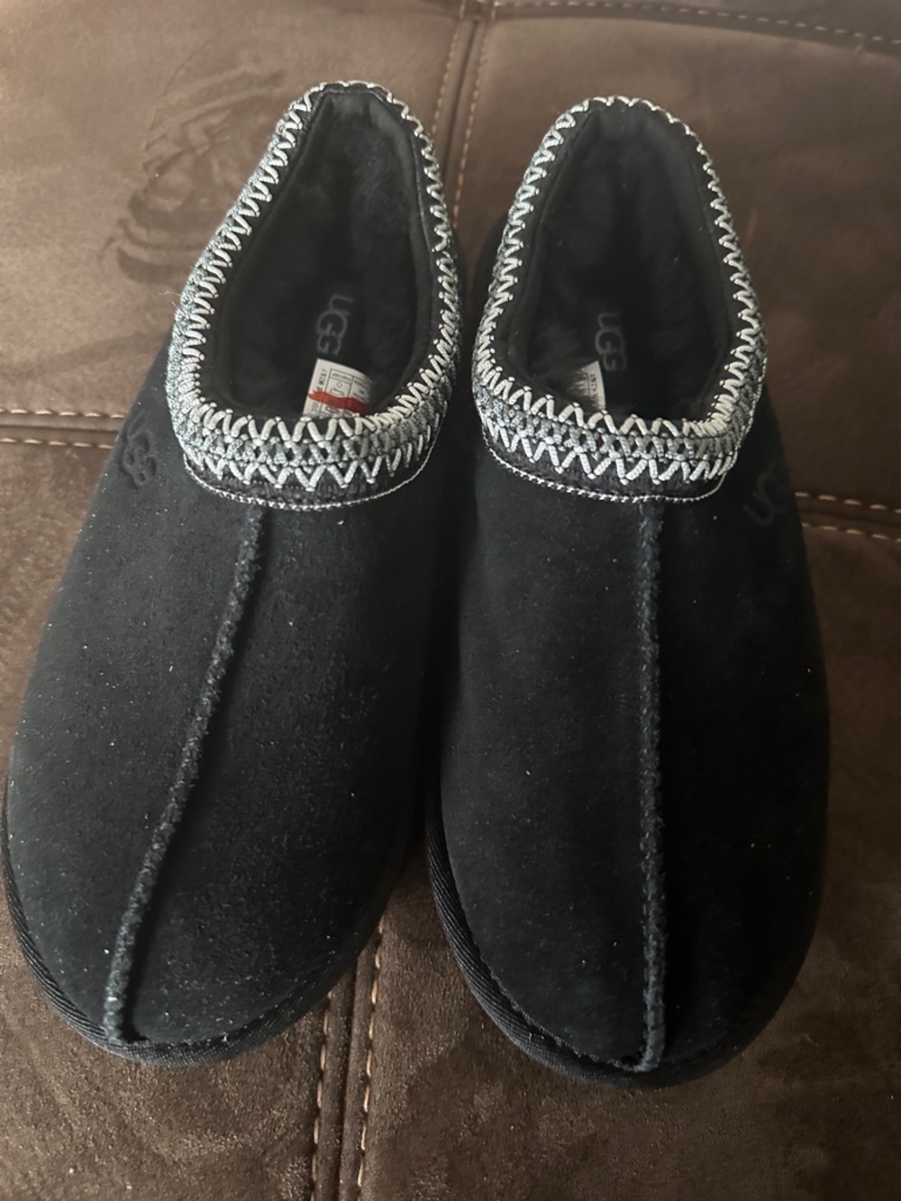 UGG Black Suede Slip-On Moccasin Slippers with Silver Stitch Trim